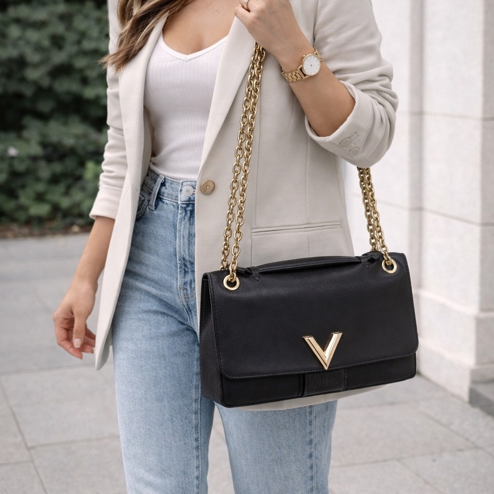 Louis Vuitton Elegant Black Leather Handbag with Gold Chain